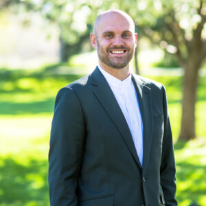 Headshot of Turner Botton in formal attire.